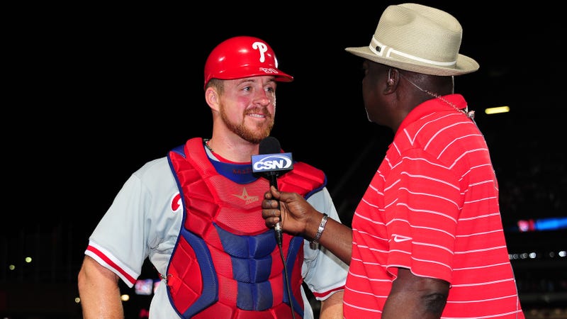 Erik Kratz of the Philadelphia Phillies is interviewed by Gary Matthews after the game against the Atlanta Braves at Turner Field on August 31, 2012 in Atlanta, Georgia.