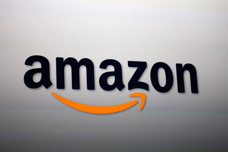 The Amazon logo is projected onto a screen at a press conference on September 6, 2012 in Santa Monica, California.