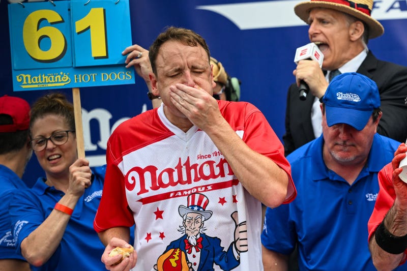 Defending champion Joey Chestnut competes in the 2023 Nathan's Famous Fourth of July International Hot Dog Eating Contest on July 4, 2023 at Coney Island in Brooklyn.