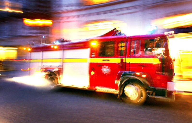 Two people are dead after a fire truck crashes into building in Westport