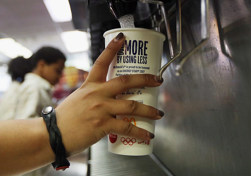 A customer fills a 21 ounce cup with soda at a 'McDonalds' on September 13, 2012 in New York City.
