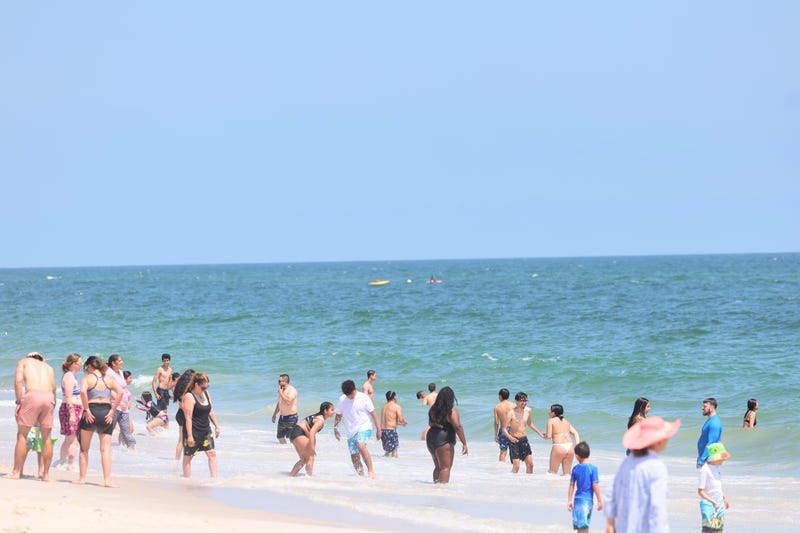 Beachgoers are seen at Jones Beach State Park.
