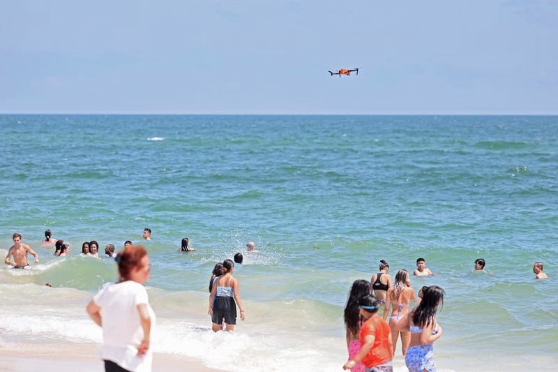 A drone monitors the waters at Jones Beach State Park