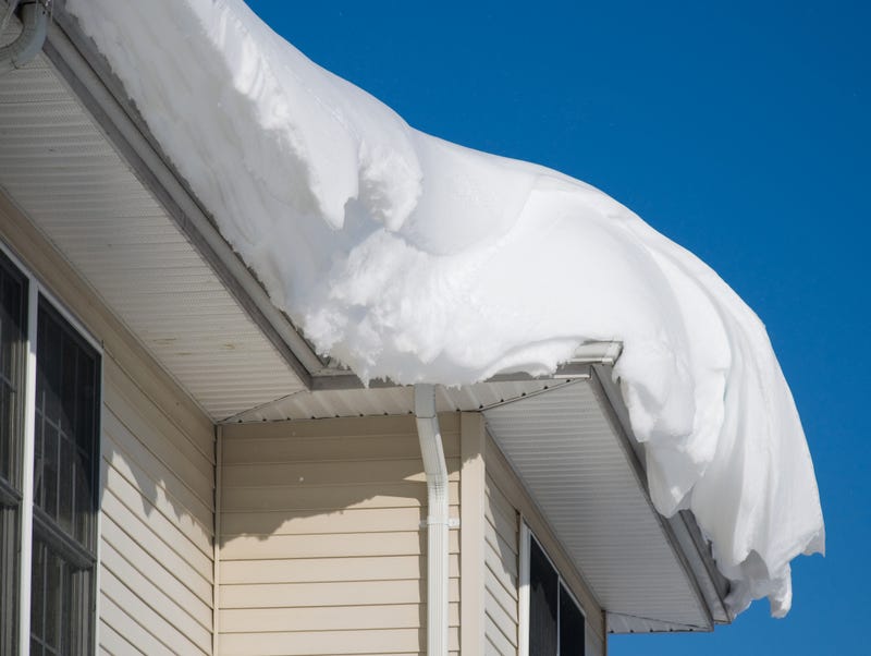 Snow collected on a roof after a winter storm. 
