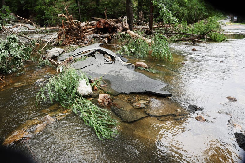 A severely damaged road is closed near Bear Mountain State Park following a night of heavy rain and flooding on July 10, 2023 in Highland Falls, New York. The storm washed out roads and bridges throughout New York State, stranding people in their homes and vehicles. One person was confirmed killed in New York Sate after being overwhelmed by water.