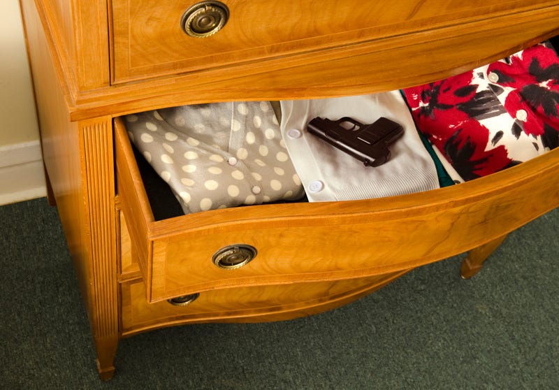 Gun in dresser drawer