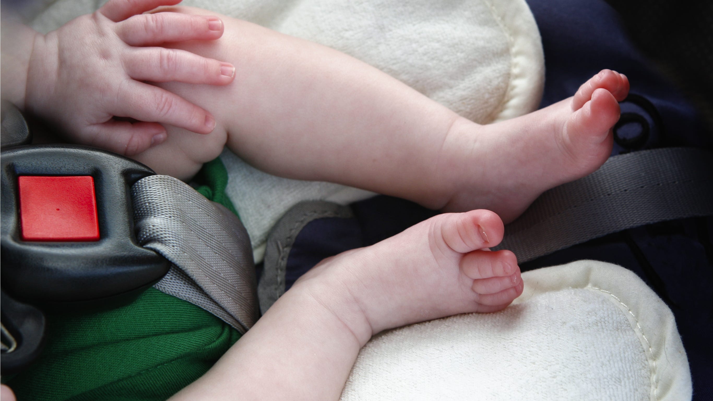Young woman arrested after newborn & 2-year-old child found abandoned in car seats behind dumpster in Oakland Co.