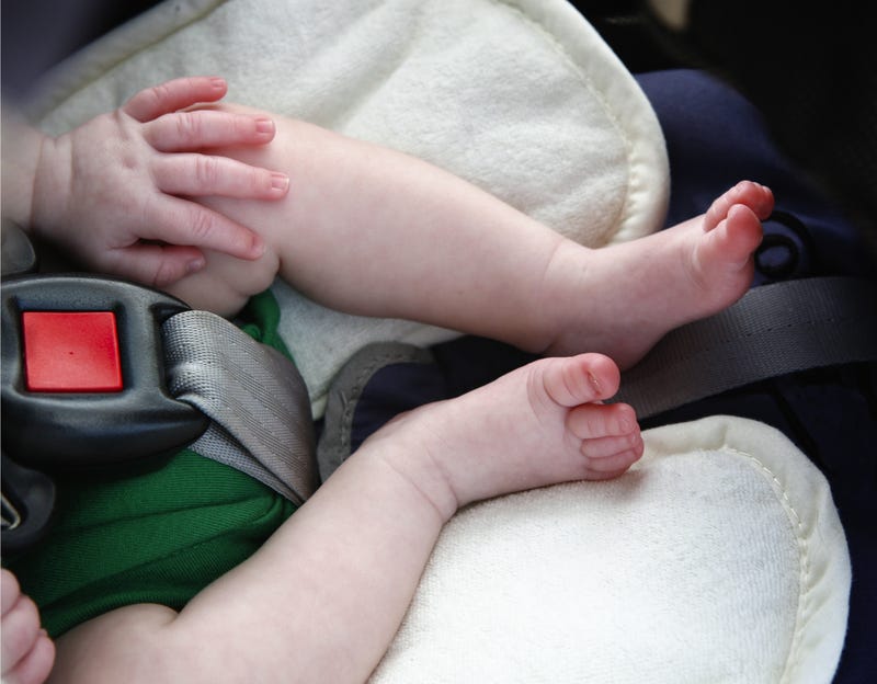 A young woman was arrested over the weekend after authorities found two young children -- including a newborn -- left in car sets behind a dumpster in Madison Heights.