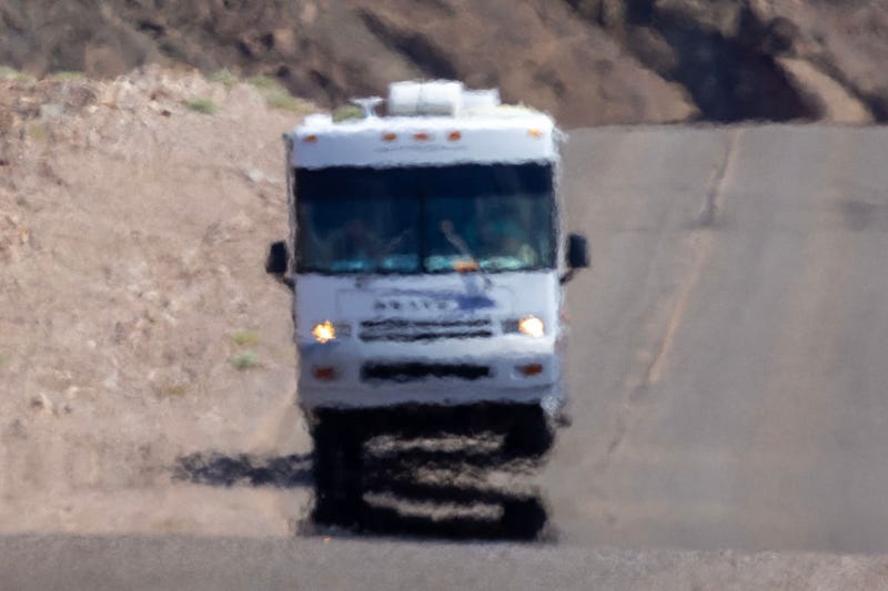 : An RV shimmers in the heat haze as the temperature rises past about 127 degrees Fahrenheit on a day that could set a new world heat record in Death Valley National Park on July 16, 2023 near Furnace Creek, California.