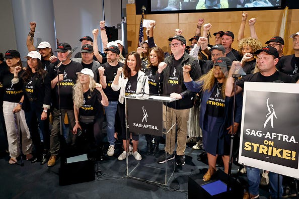 (Center L-R) Frances Fisher, Ben Whitehair, Frances Fisher, SAG President Fran Drescher, Joely Fisher, National Executive Director and Chief Negotiator of SAG-AFTRA Duncan Crabtree-Ireland, Michael Gaston, Michelle Hurd, and SAG-AFTRA members are seen as SAG-AFTRA National Board holds a press conference for vote on recommendation to call a strike regarding the TV/Theatrical contract at SAG-AFTRA on July 13, 2023 in Los Angeles, California.