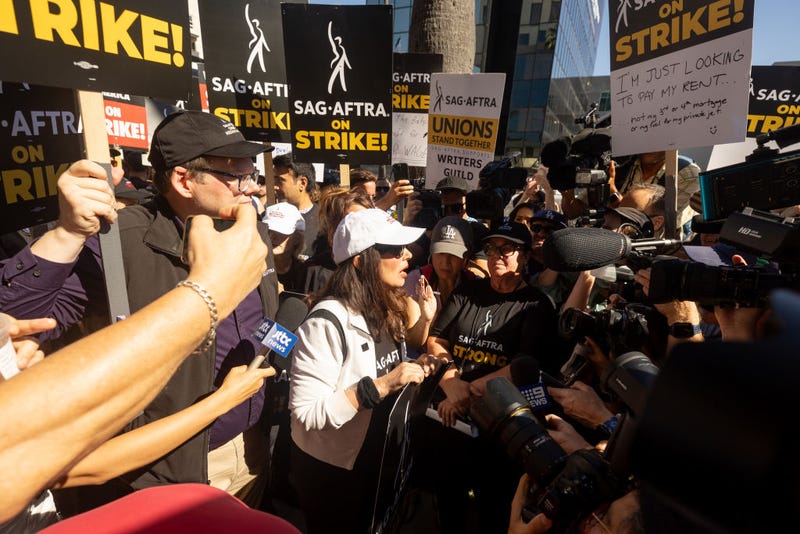 SAG-AFTRA President Fran Drescher speaks with members of the media while joining SAG-AFTRA and WGA members as they picket outside Netflix studios on July 14, 2023 in Los Angeles, California. 