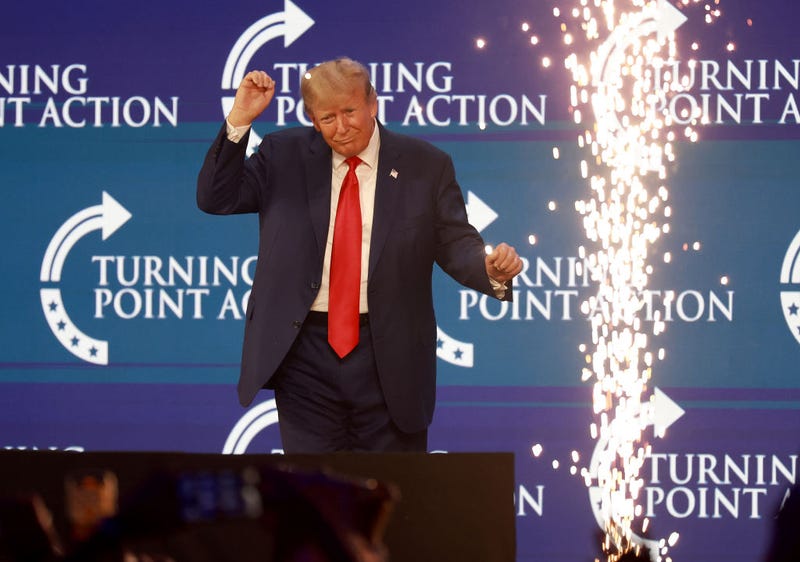 Former President Donald Trump briefly dances after he spoke at the Turning Point Action conference as he continues his 2024 presidential campaign on July 15, 2023 in West Palm Beach, Florida.