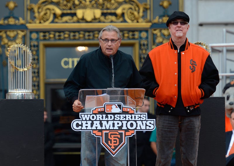 San Francisco Giants broadcast team of Duane Kuiper (L) and Mike Krukow (R) speaks to the fans during the Giants' victory parade and celebration on October 31, 2012 in San Francisco, California.