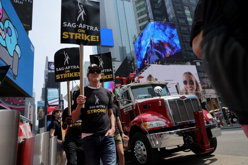 kevin bacon and other actors striking on picket line