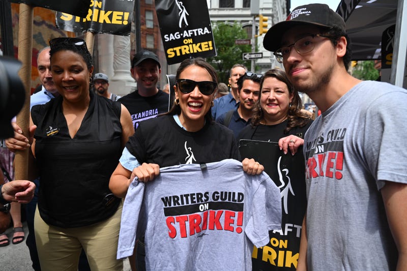 Alexandria Ocasio-Cortez walks the picket line in support of the SAG-AFTRA and WGA strike on July 24, 2023 in New York City. 