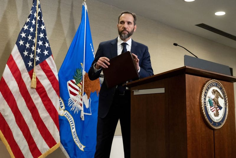 Special counsel Jack Smith leaves after speaking to the press at the U.S. Department of Justice building in Washington, DC, on August 1, 2023.