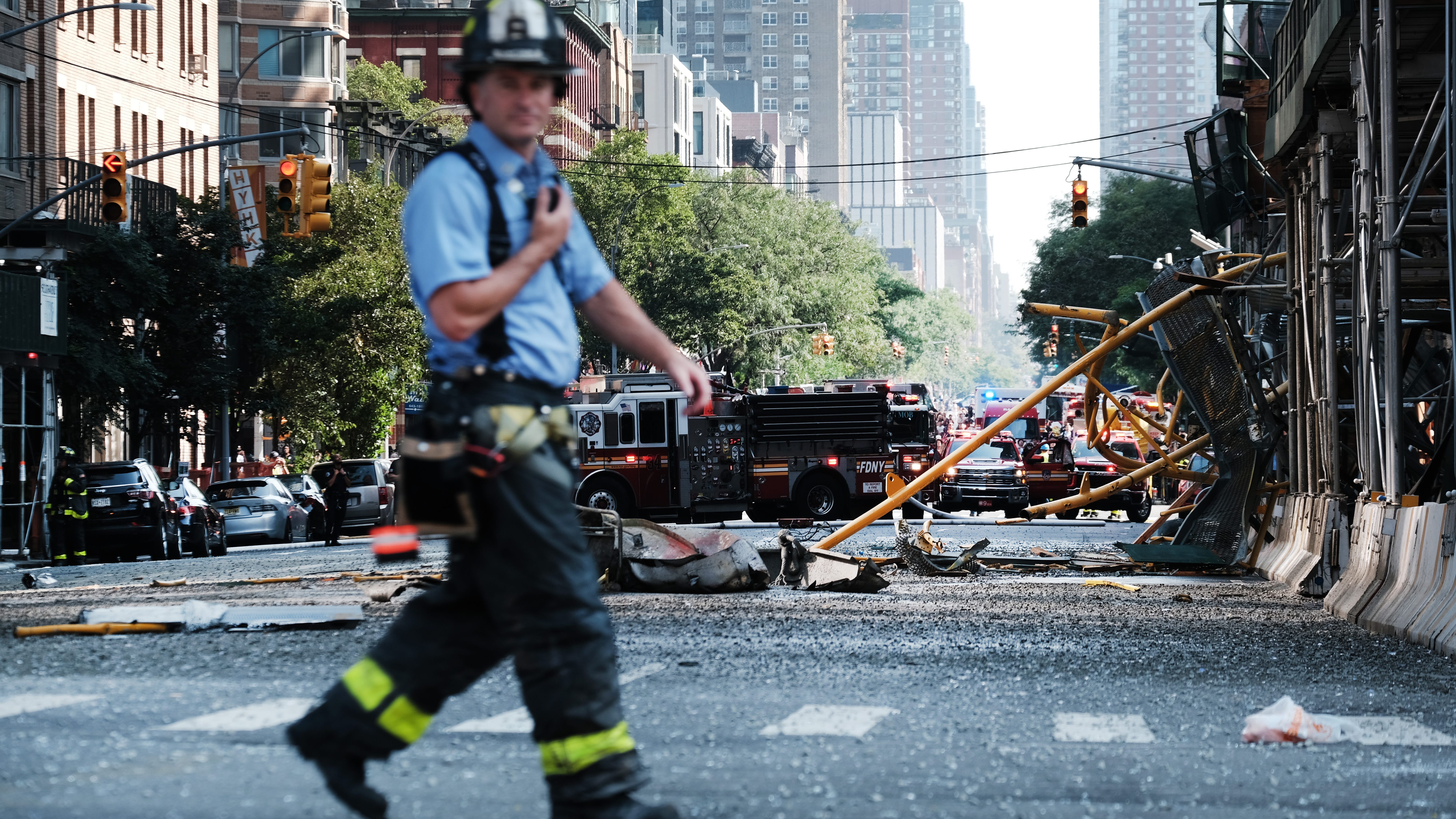 High-rise crane bursts into flames, collapses onto Hell's Kitchen street; at least 6 injured