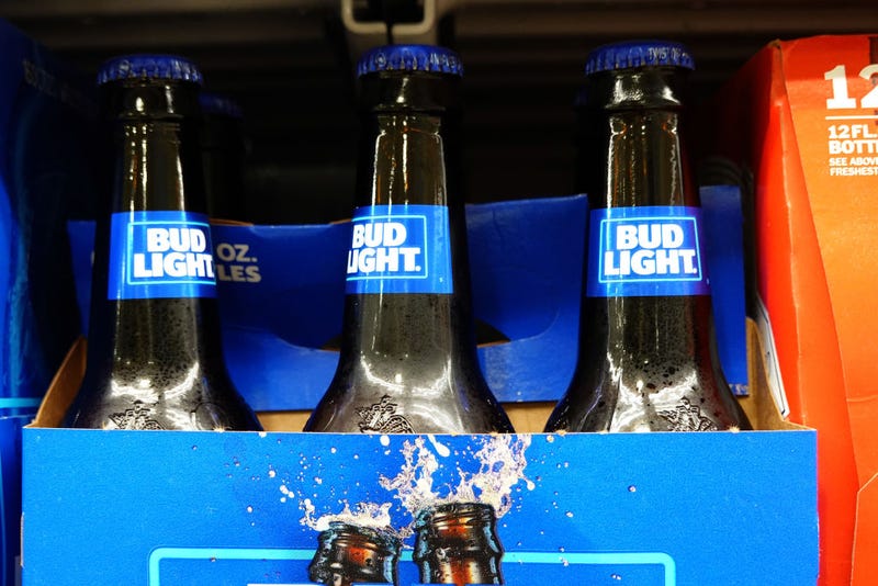 Bud Light, made by Anheuser-Busch, sits on a store shelf on July 27, 2023 in Miami, Florida. Anheuser-Busch InBev announced it will lay off hundreds of corporate employees as its Bud Light beer sales continue to struggle. (Photo by Joe Raedle/Getty Images)