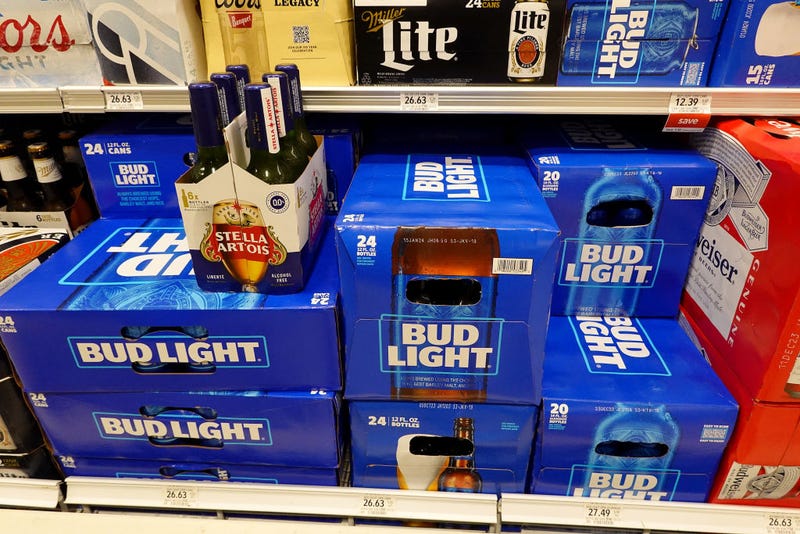  Bud Light, made by Anheuser-Busch, sits on a store shelf on July 27, 2023 in Miami, Florida. Anheuser-Busch InBev announced it will lay off hundreds of corporate employees as its Bud Light beer sales continue to struggle. (Photo by Joe Raedle/Getty Images)