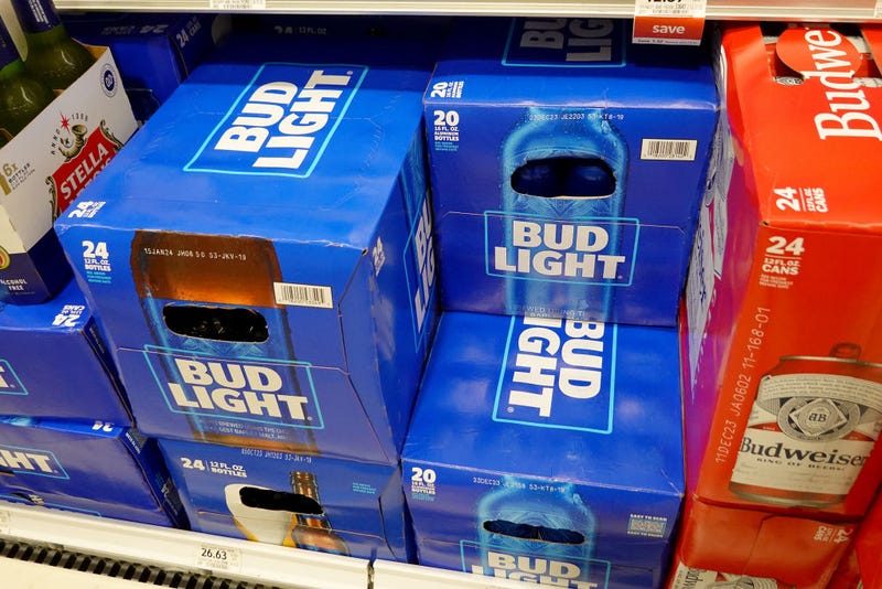 Bud Light, made by Anheuser-Busch, sits on a store shelf on July 27, 2023 in Miami, Florida. Anheuser-Busch InBev announced it will lay off hundreds of corporate employees as its Bud Light beer sales continue to struggle. (Photo by Joe Raedle/Getty Images)