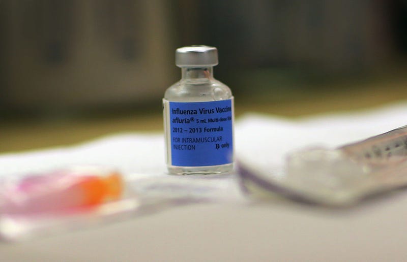A bottle of influenza virus vaccine is seen at the CVS/pharmacy's MinuteClinic on December 4, 2012 in Miami, Florida.