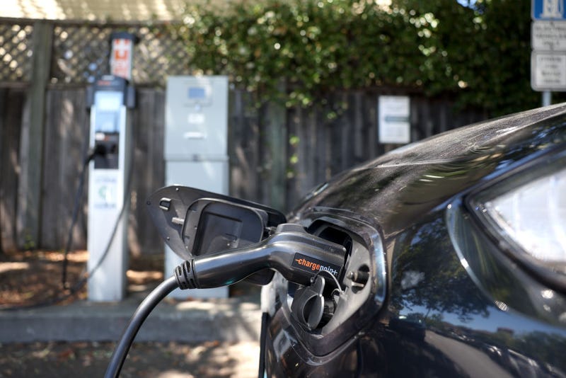 A Nissan electric car sits parked at a Charge Point EV charging station on July 28, 2023 in San Anselmo, California. Seven major automakers announced plans earlier this week to increase the number of high-powered electric vehicle chargers in the country with 30,000 new charging stations along highways and in urban areas. According to the Energy Department, there are currently an estimated 32,000 chargers across the country. (Photo by Justin Sullivan/Getty Images)