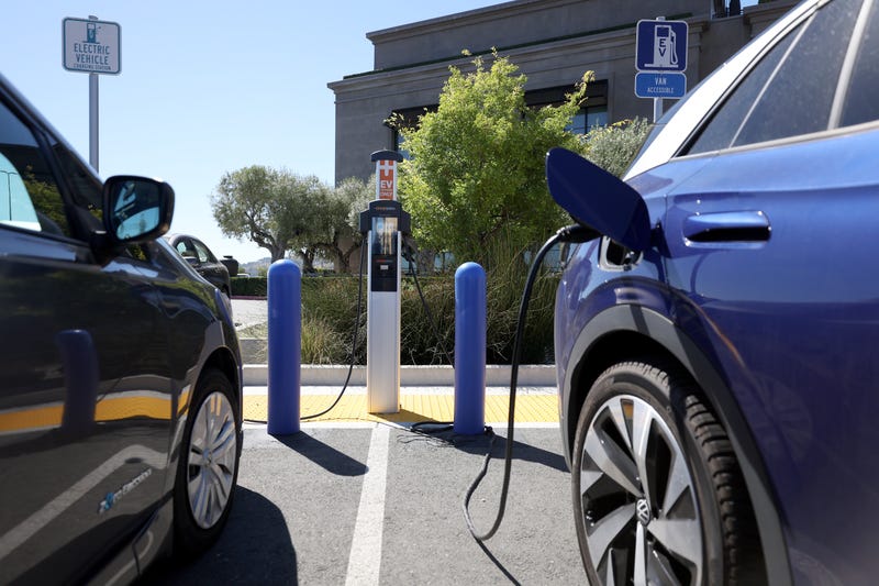 electric vehicles parked at a charging station