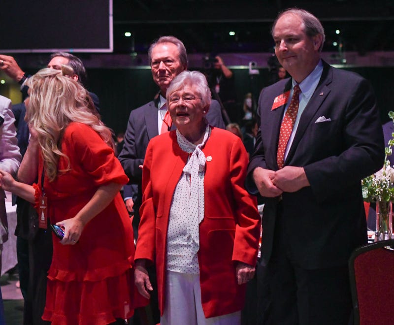 Alabama Gov. Kay Ivey listens to former U.S. President Donald Trump speak during the Alabama Republican Party’s 2023 Summer meeting at the Renaissance Montgomery Hotel on August 4, 2023 in Montgomery, Alabama. Trump's appearance in Alabama comes one day after he was arraigned on federal charges in Washington, D.C. for his alleged efforts to overturn the 2020 election. (Photo by Julie Bennett/Getty Images)