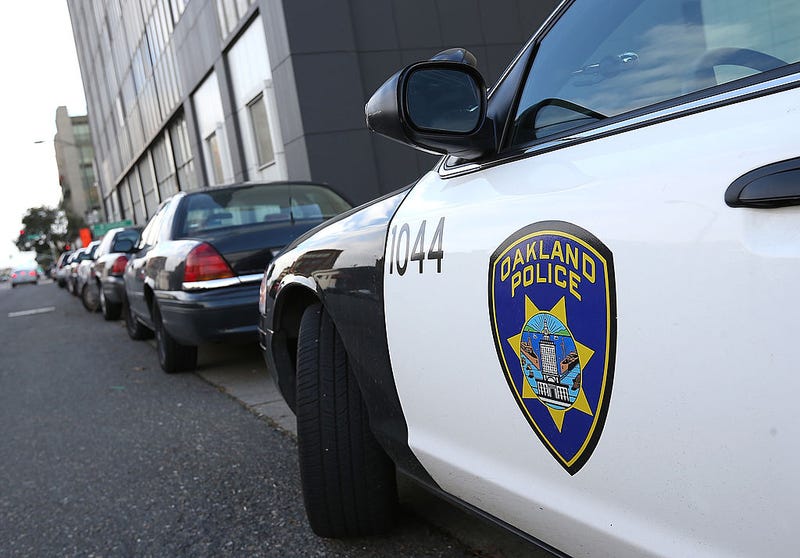 An Oakland Police patrol car sits in front of the Oakland Police headquarters on December 6, 2012 in Oakland, California. Oakland City officials have come to an agreement to forfeit broad power over the Oakland Police Department to a court-appointed director to avoid federal takeover.