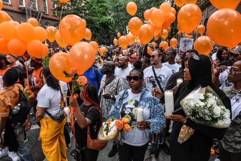 People participate in a memorial march for O'Shae Sibley in New York City on Aug. 5, 2023