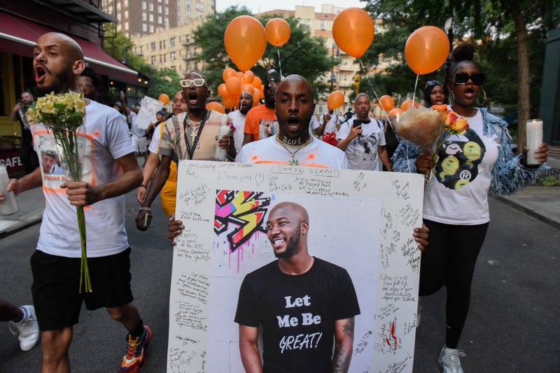 People participate in a memorial march for O'Shae Sibley in New York City on Aug. 5, 2023