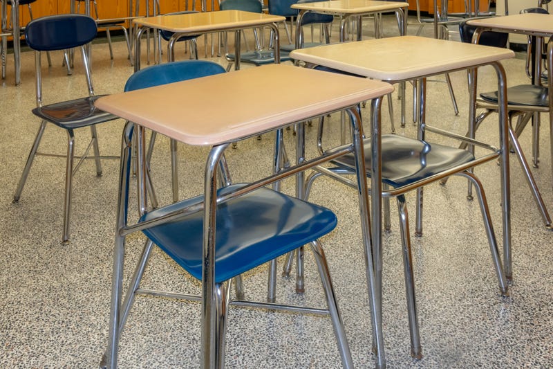 Desks in an empty classroom