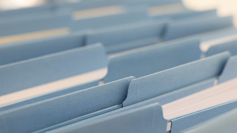 White paper in a package with bookmarks for documents, file binder, close-up