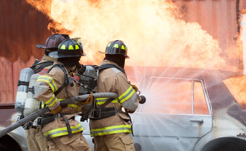 firefighters putting out a fire