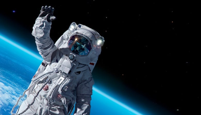 Astronaut floating through space