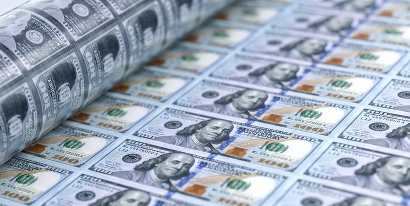 Hundred dollar bills being printed. 