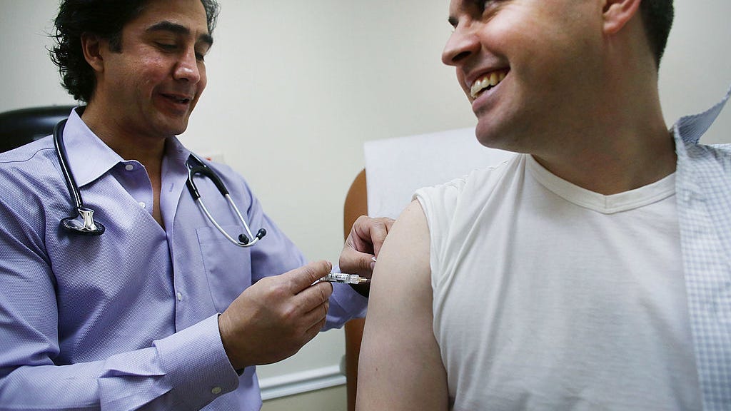 Health officials urge Americans to receive flu vaccine to avoid 'twin pandemic'