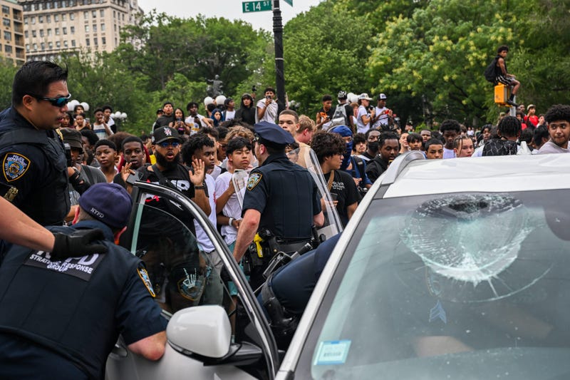 Numerous cars were damaged around Union Square during the riot on Aug. 4, 2023