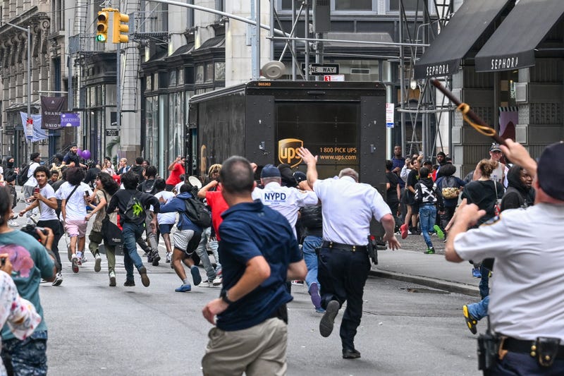 Plates are thrown near Chelsea as members of the NYPD respond to a riot on Aug. 4, 2023