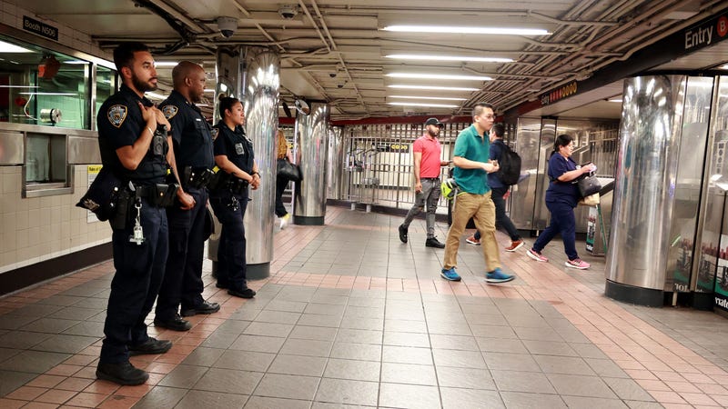 NYPD transit officers patrol the 34th Street–Herald Square station station on Aug. 14, 2023