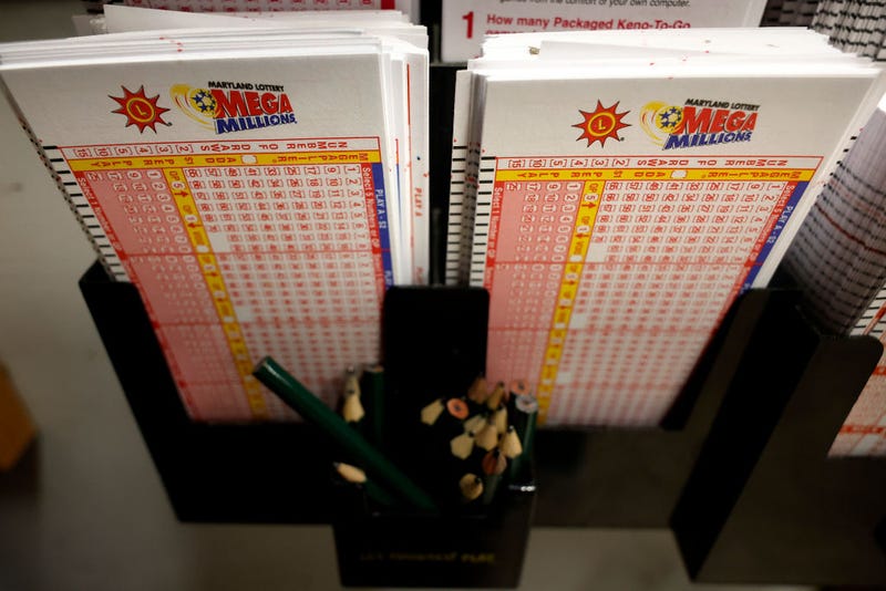 Mega Millions forms are stacked and waiting on players on August 07, 2023 in Silver Spring, Maryland. The Mega Millions jackpot is projected to reach an estimated $1.55 billion for its next drawing on Tuesday, the lottery’s largest prize ever.