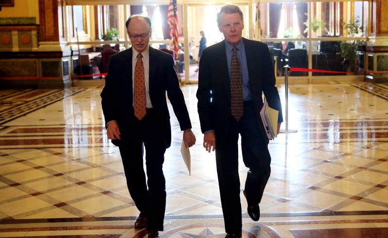 Then-House Speaker Michael Madigan, right, walks with Tim Mapes, his chief of staff, outside the governor's office at the Illinois Capitol in Springfield in 2013.