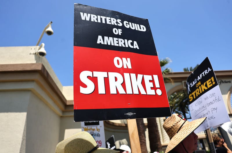 Striking SAG-AFTRA members picket with striking WGA (Writers Guild of America) workers outside Paramount Studios on August 7, 2023 in Los Angeles, California. Members of SAG-AFTRA. 