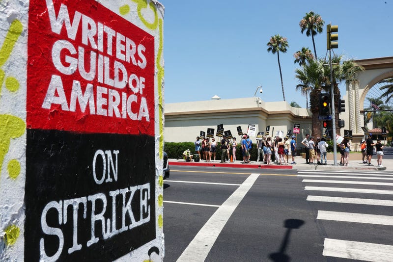 Striking SAG-AFTRA members picket with striking WGA (Writers Guild of America) workers outside Paramount Studios on August 7, 2023 in Los Angeles, California.