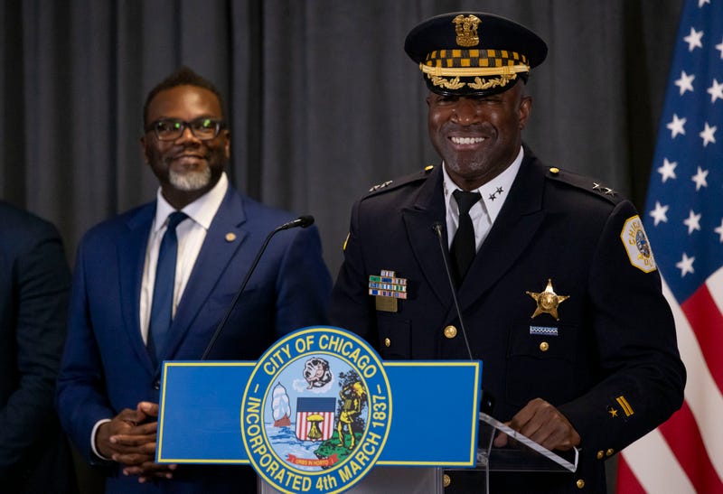 Johnson and Snelling at lectern