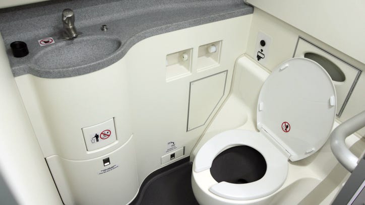Woman tests positive for COVID on flight, isolates in bathroom for 5 hours