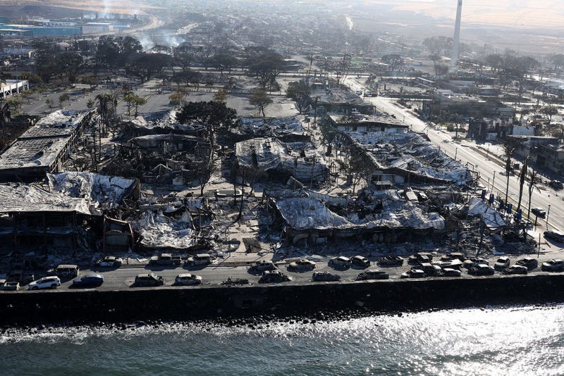 In an aerial view, cars destroyed by wildfire line Front Street on August 11, 2023 in Lahaina, Hawaii. 