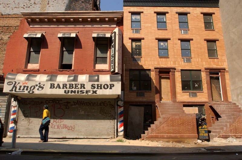 A new apartment building is under construction August 16, 2001 in Harlem, New York City. A small but vocal community in Harlem is upset at the Upper Manhattan Empowerment Zone (UMEZ), claiming that the historically black community''s recent gentrification programs have driven some local businesses out and raised real estate prices on many properties.