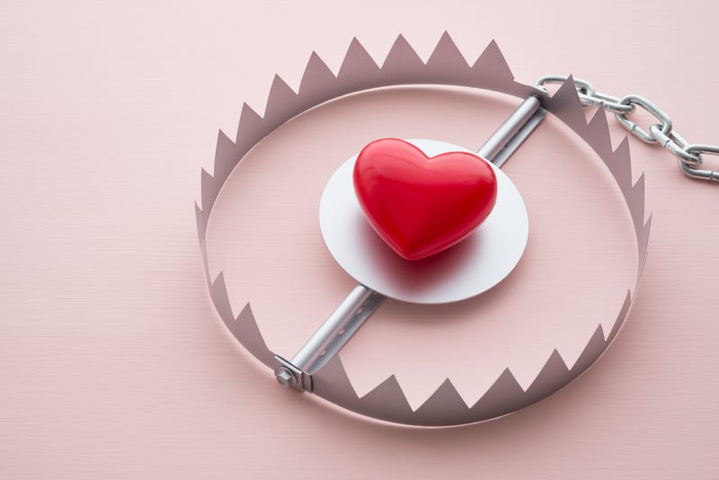 Heart inside of a bear trap