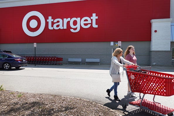 Customers shop at a Target store on August 16, 2023 in Chicago, Illinois. 